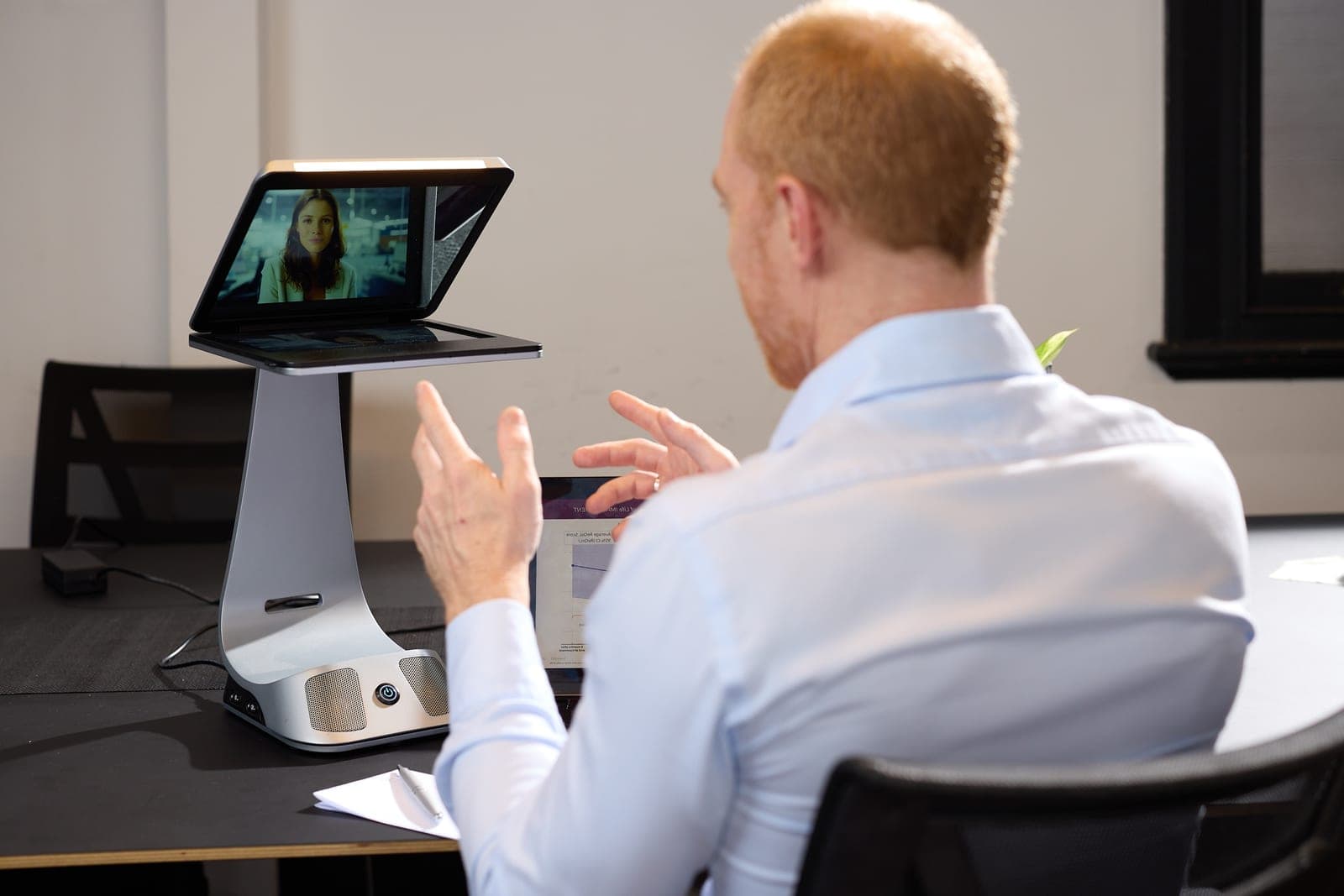 Over-the-shoulder view of a telehealth session with iVi